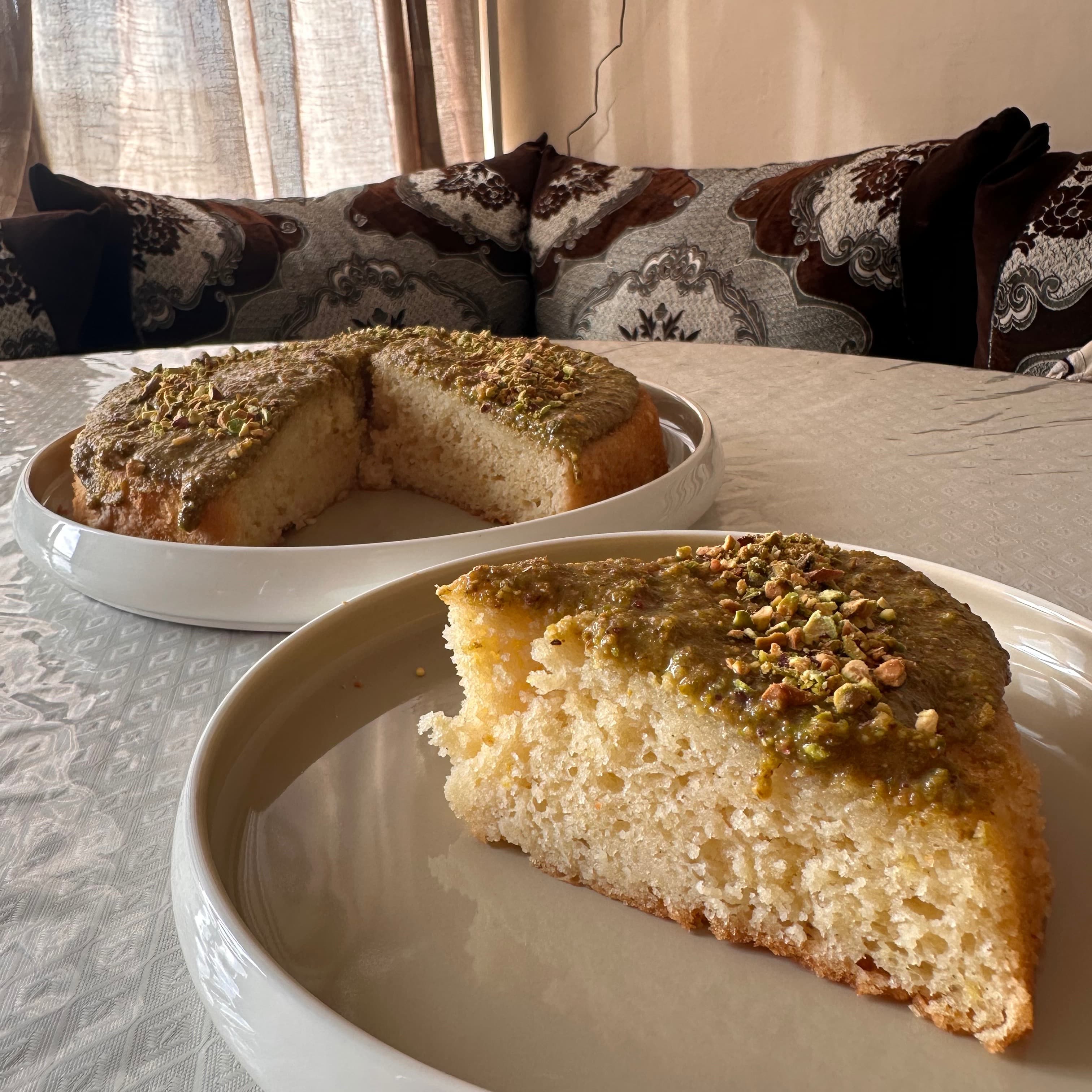 Moist lemon pistachio cake with creamy pistachio spread